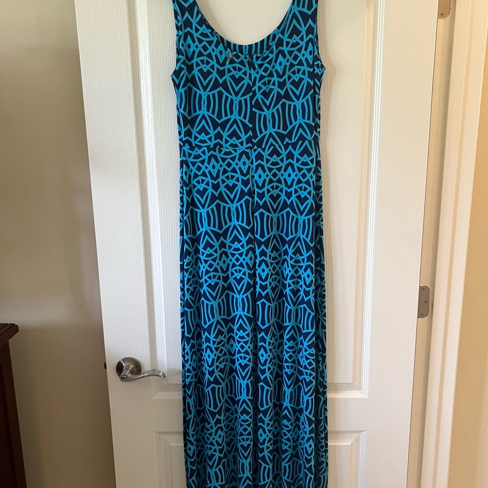 Zen brand dress. The materials are: 92% Rayon and 8% Spandex. Never worn.